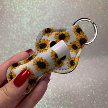 Load image into Gallery viewer, SunKeeper || White w/Sunflowers || Custom Sunflower Keyring Balm Holder || Neoprene Keychain